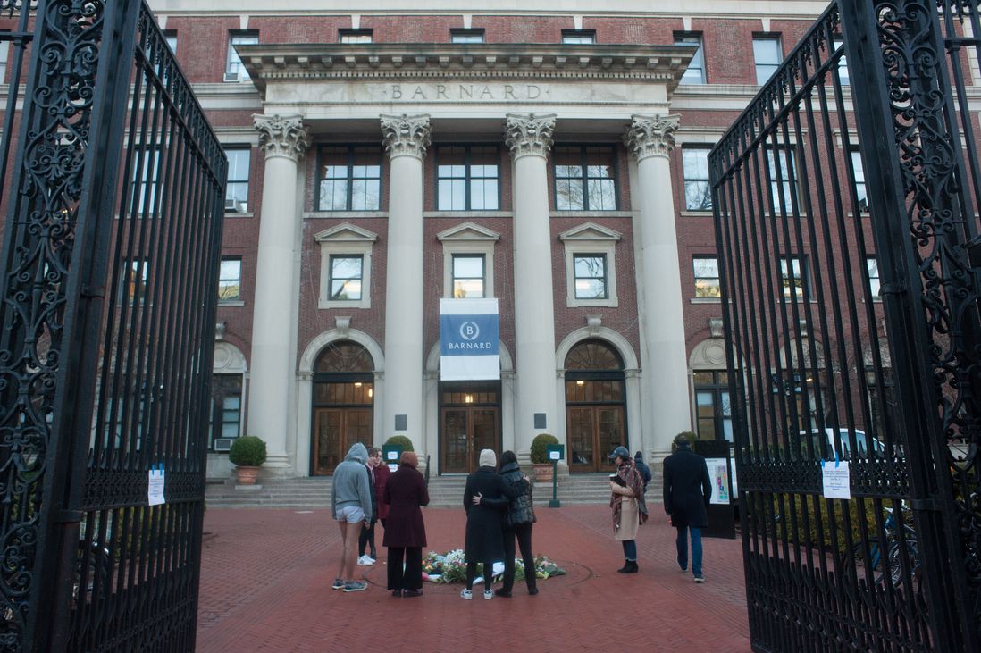 Students place flowers in remembrance of Tessa Majors in the courtyard of Barnard College.
